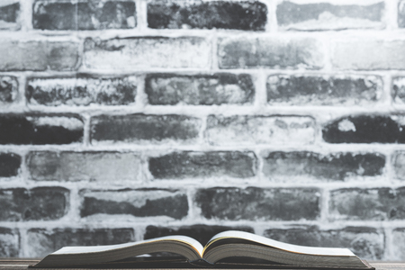 Brick background and bookの写真素材