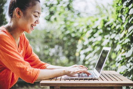 Computer and femaleの写真素材