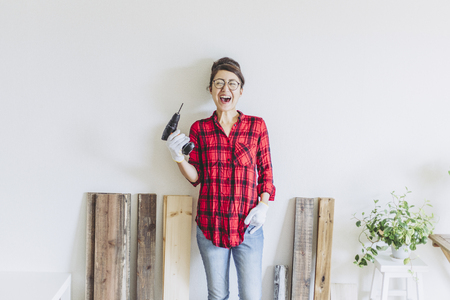 asian woman posing with diy toolsの写真素材