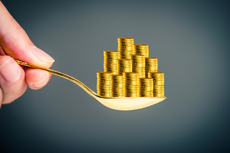 Spoon and coinの写真素材