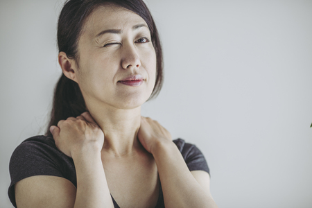 Asian women and stiff shouldersの写真素材