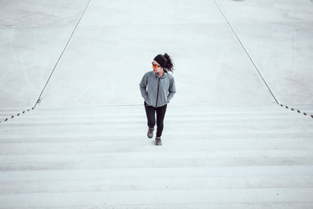 Fitness woman on white concrete ground