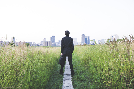 Urban landscape and suit menの写真素材