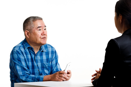 Business woman and elderly manの写真素材
