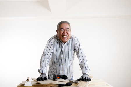 Senior male and DIYの写真素材