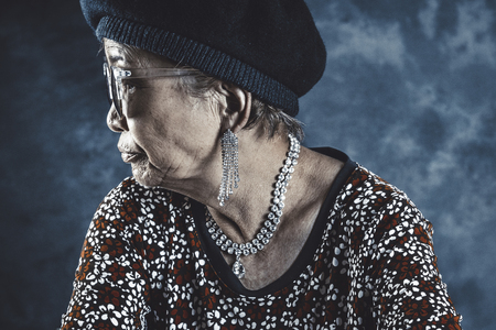 Asian senior woman wearing black sunglassesの写真素材