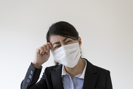 Medical masks and Asian womenの写真素材