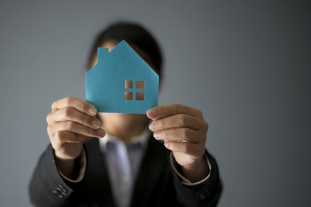 Business women and housesの写真素材