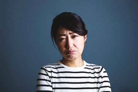Facial expression of a crying woman