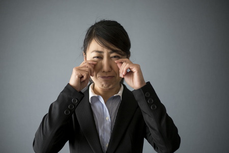 Crying business womanの写真素材