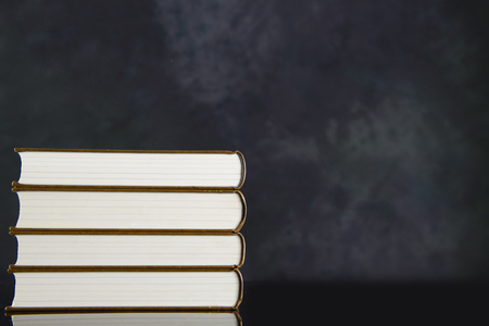 Black background and bookの写真素材