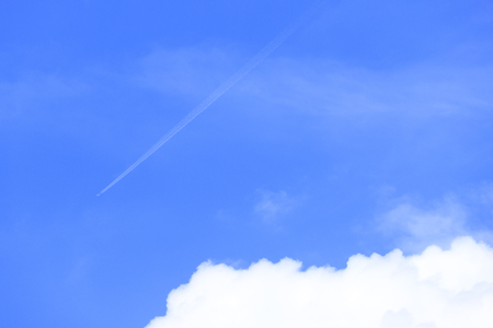 Blue sky and airplane cloudの写真素材