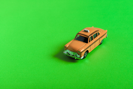 Green background and taxiの写真素材