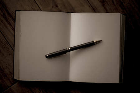 Pen and bookの写真素材