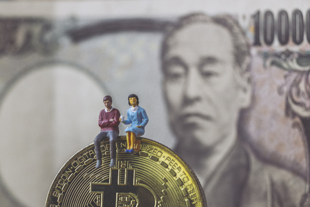 Bit coins and miniaturesの写真素材