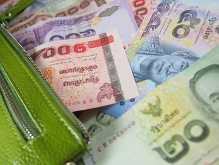 Thai Notes Money in the Green Purseの写真素材