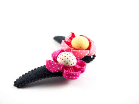 Twin hair clip, handmade flowers, made from colorful fabric, sunflower shape, modern hair accessory, isolated on white backgroundの写真素材