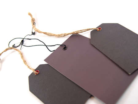 Empty tags with string, price tags, gift tags, sale tags, retail of goods tags, isolated on white backgroundの写真素材