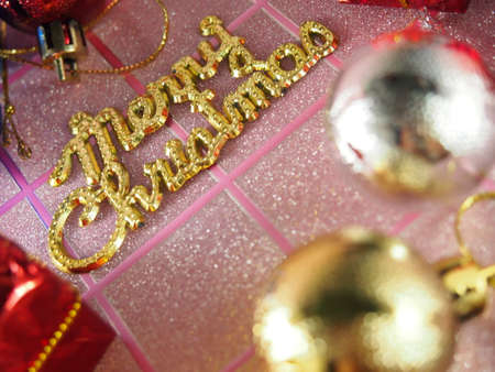 Merry Christmas Letters on pink tartan backgroundの写真素材