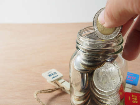 Saving, collection money on piggy bank glassの写真素材