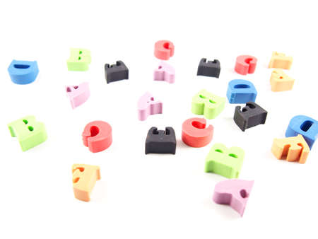 Stationery, eraser with colorful English letters, isolated on white backgroundの写真素材