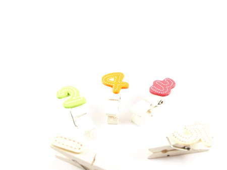Handmade arabic numeral on paper clips, one two, four, three, five numberの写真素材