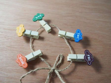 Paper clips on string, business day ideaの写真素材
