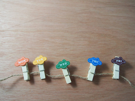 Wooden clips as business day idea