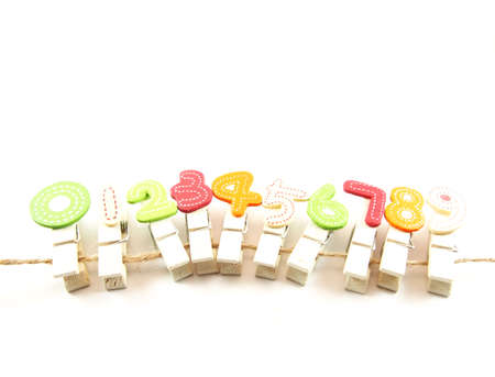 Wooden paper clips as one to zero numberの写真素材