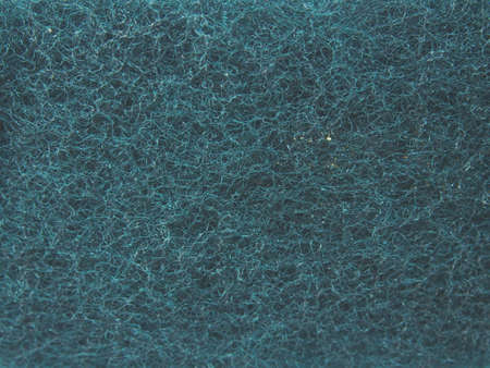 Dark green scotch-brite pattern backgroundの写真素材