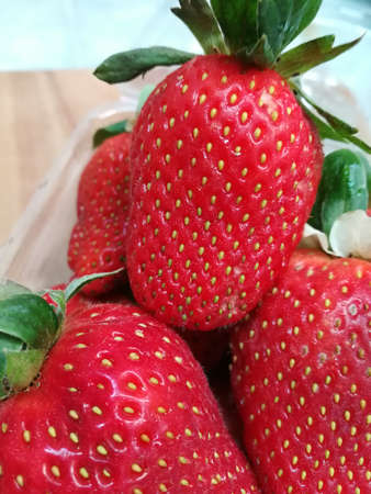 Pile of red fresh strawberries, thai fruit, snack diet
の写真素材