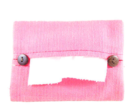 Fabric packet for tissue, handmade craft with decorated wooden buttons, isolated on white background
の写真素材