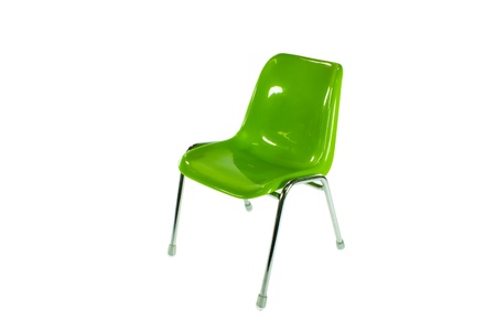 green plastic chair on white backgroundの写真素材