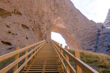 Stairs leading to mountain arc in xinjiang chinaの写真素材