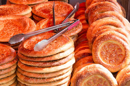Pile of naan bread at a market in Xinjiang Chinaの写真素材