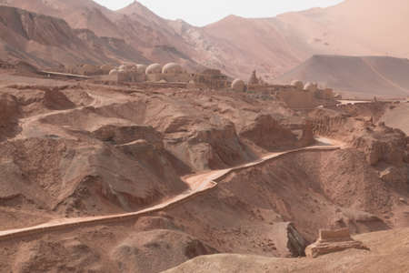 Street leading to old town in the red mountains in Chinaのeditorial素材