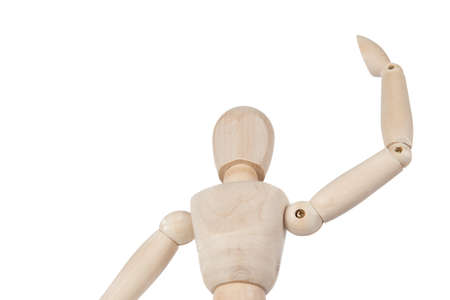 Puppet making a victory gesture on white backgroundの写真素材