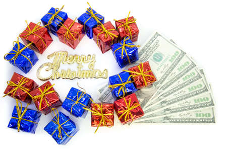 Christmas parcels with dollar as concept for christmas shopping or bonusの写真素材