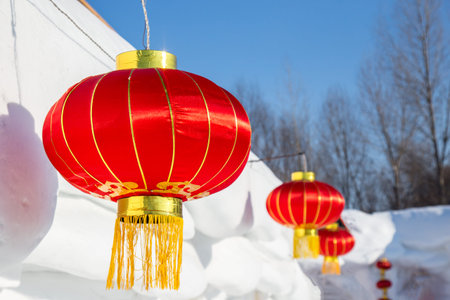 Chinese red lanterns attached to snow houseの写真素材