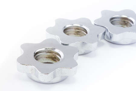 Three metal gears isolated on whiteの写真素材