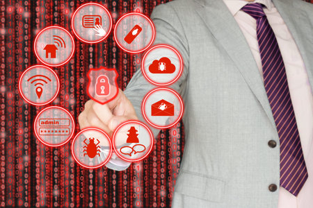 Common information security threats in a circle with a padlock in the center which is touched by a...