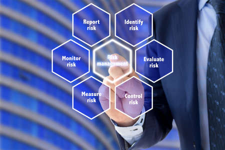 Risk management framework explained by a business expert in front of office backgroundの写真素材