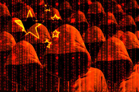 Group of hooded hackers shining through a digital chinese flag cybersecurity conceptの写真素材