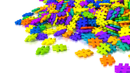 Pile of differently colored hashtag symbols on white social media concept 3D illustrationの写真素材