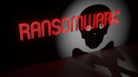 Red glowing ransomware neon sign on a dark wall and a spotlight with shadow of a skull information security concept 3D illustrationの写真素材