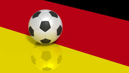 Black and white soccer ball on a reflecting german flag 3D illustrationの写真素材