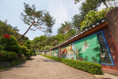 Temple footpath with wall paintingの写真素材