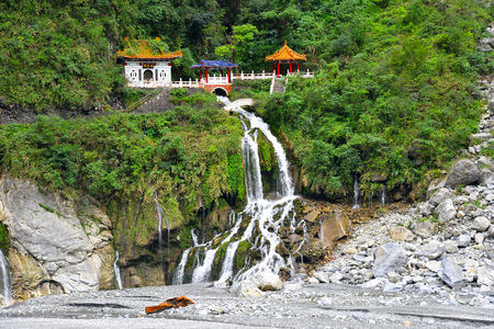 Changuang temple in Taroko National Park with a waterfallの写真素材