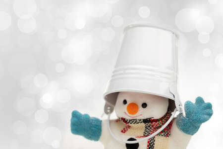 Snowman is standing in snowfall, Merry Christmas and happy New Year concept.の写真素材