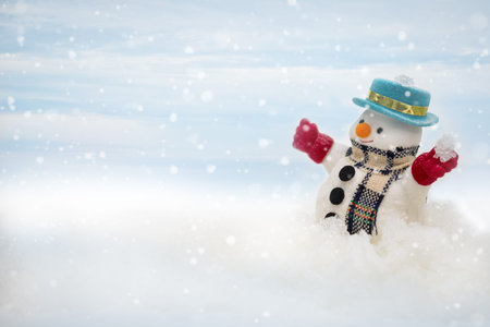 Snowman is standing in snowfall, Merry Christmas and happy New Year concept.